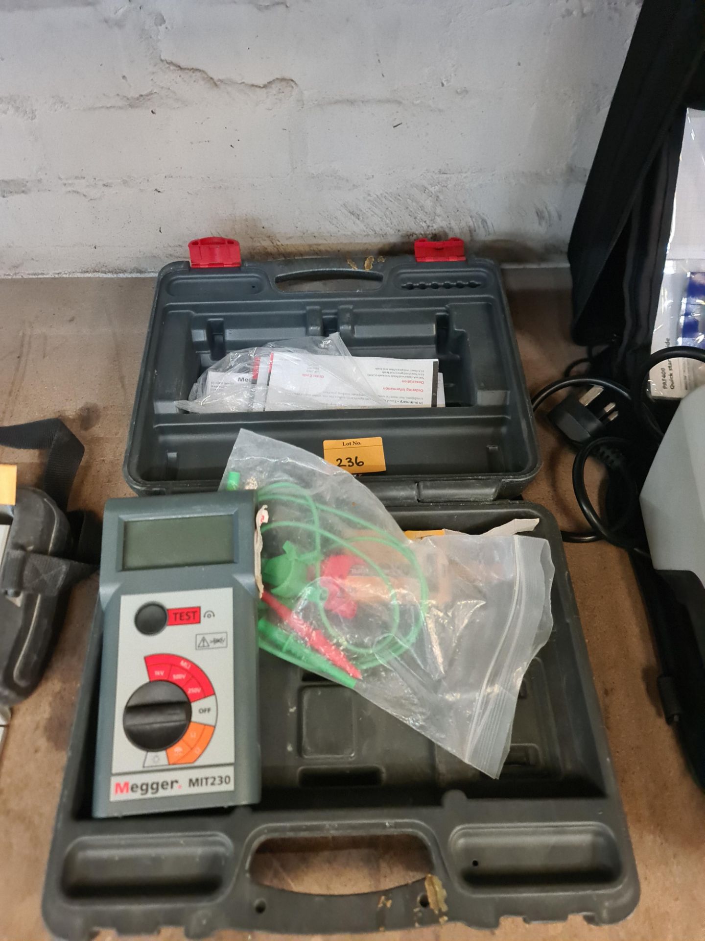 Megger insulation tester, model MIT230. This lot includes case and ancillaries