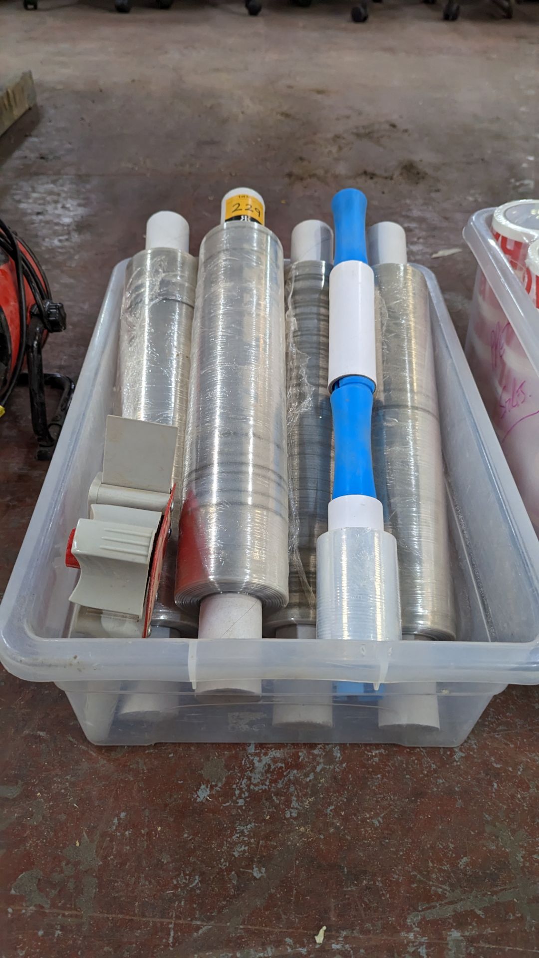 The contents of a crate of shrink wrap plus shrink wrap handle & tape gun - Image 2 of 5