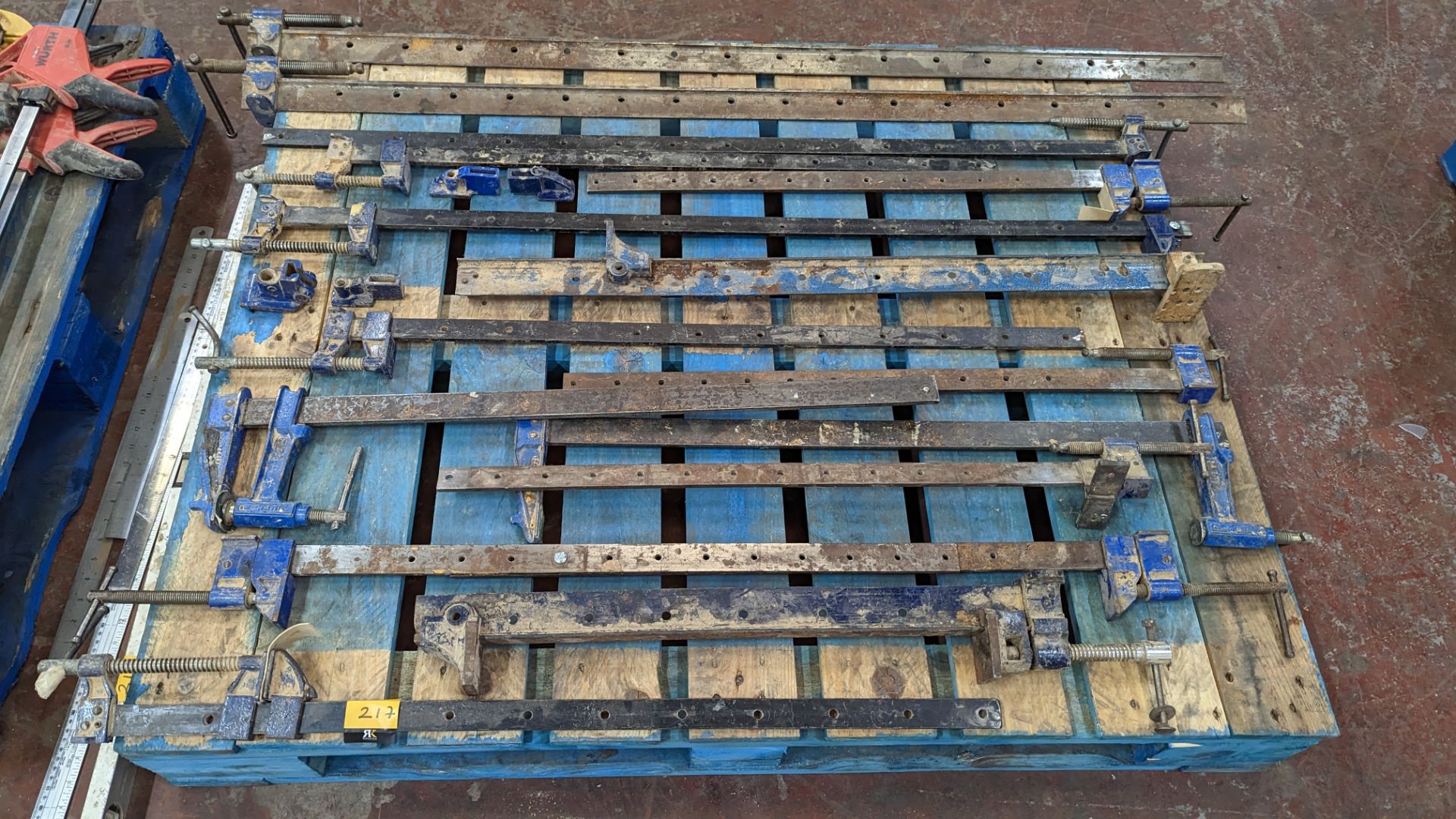 The contents of a pallet of metal clamps