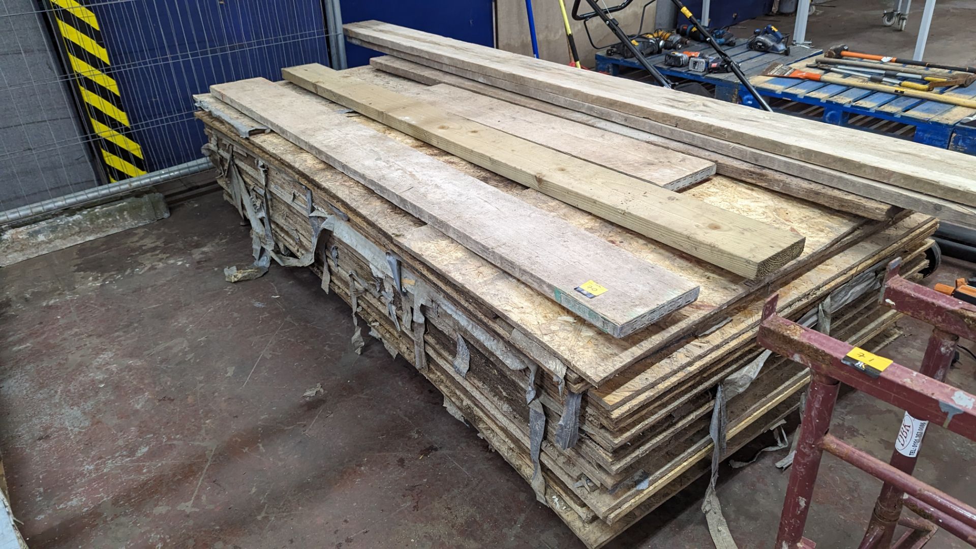 Stack of assorted OSB boards & other materials