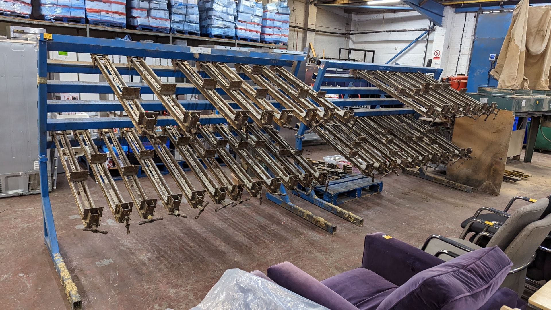 2 off panel clamp systems, by JLT. This lot comprises 2 large stands & a total of 38 detachable cla