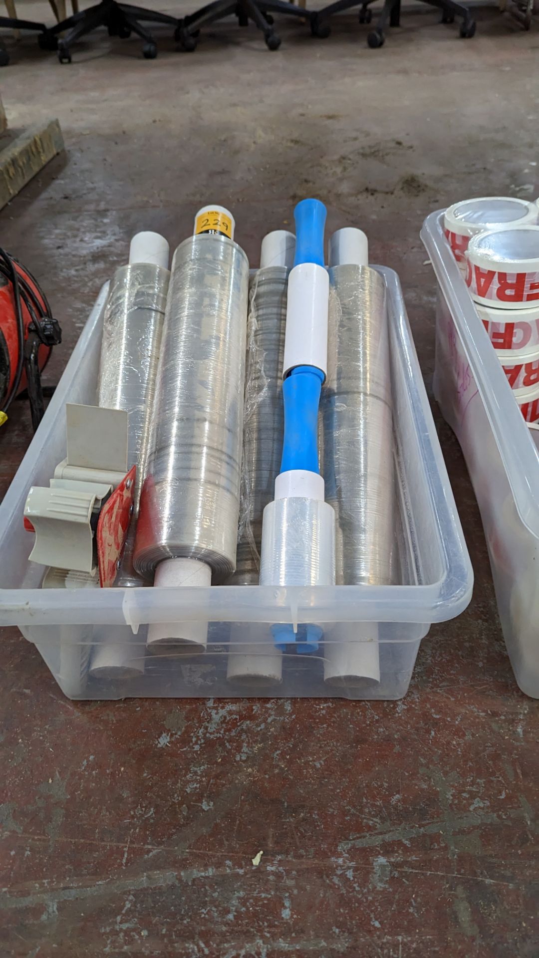 The contents of a crate of shrink wrap plus shrink wrap handle & tape gun - Image 3 of 5