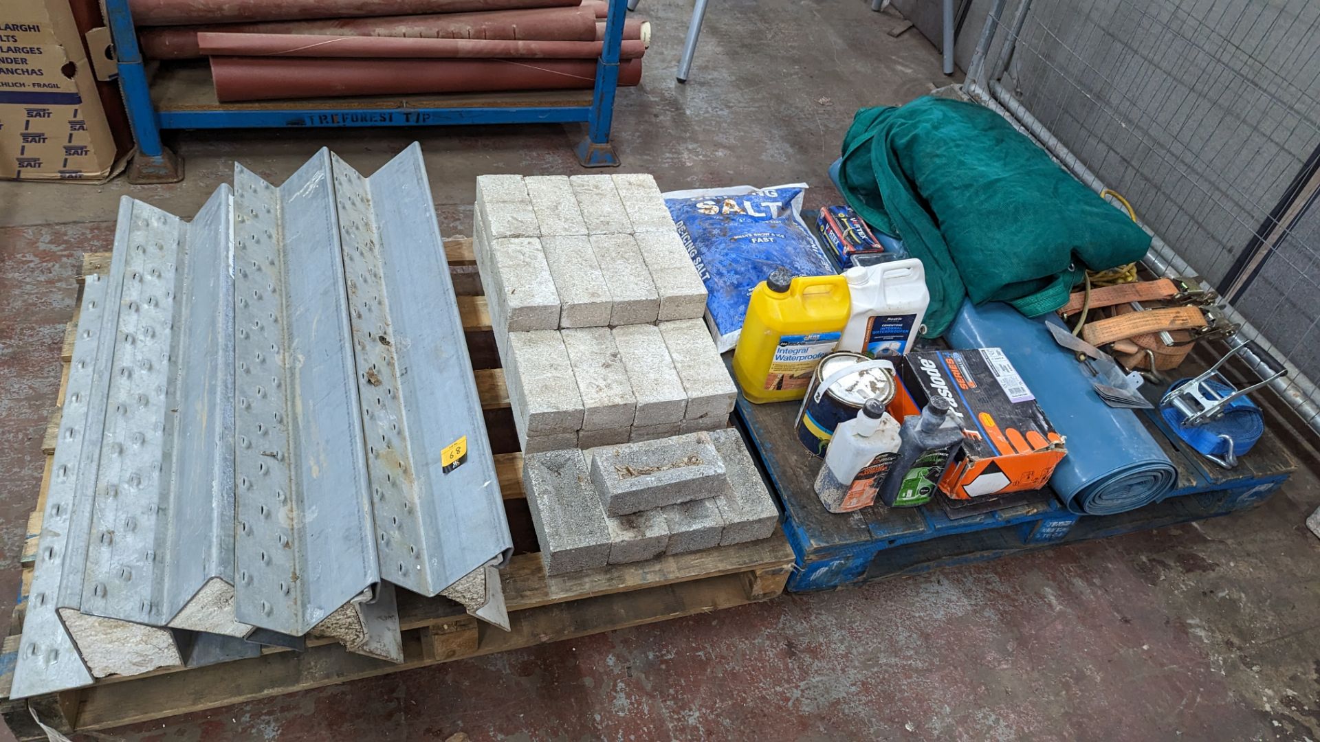 The contents of 2 pallets of miscellaneous items including bricks, brackets, consumables, ratchet st