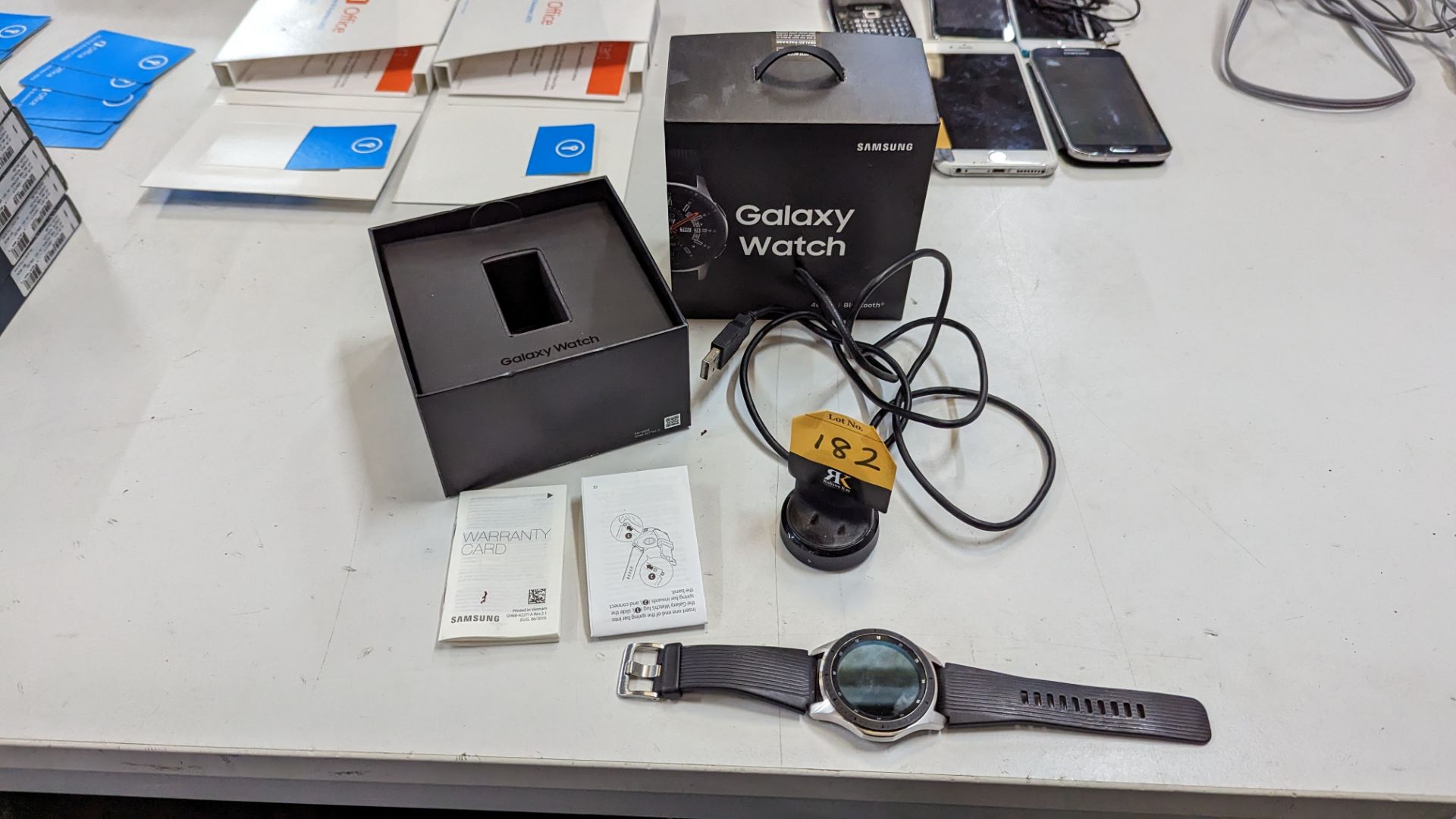 Samsung Galaxy 46mm smartwatch including charging base with USB cable