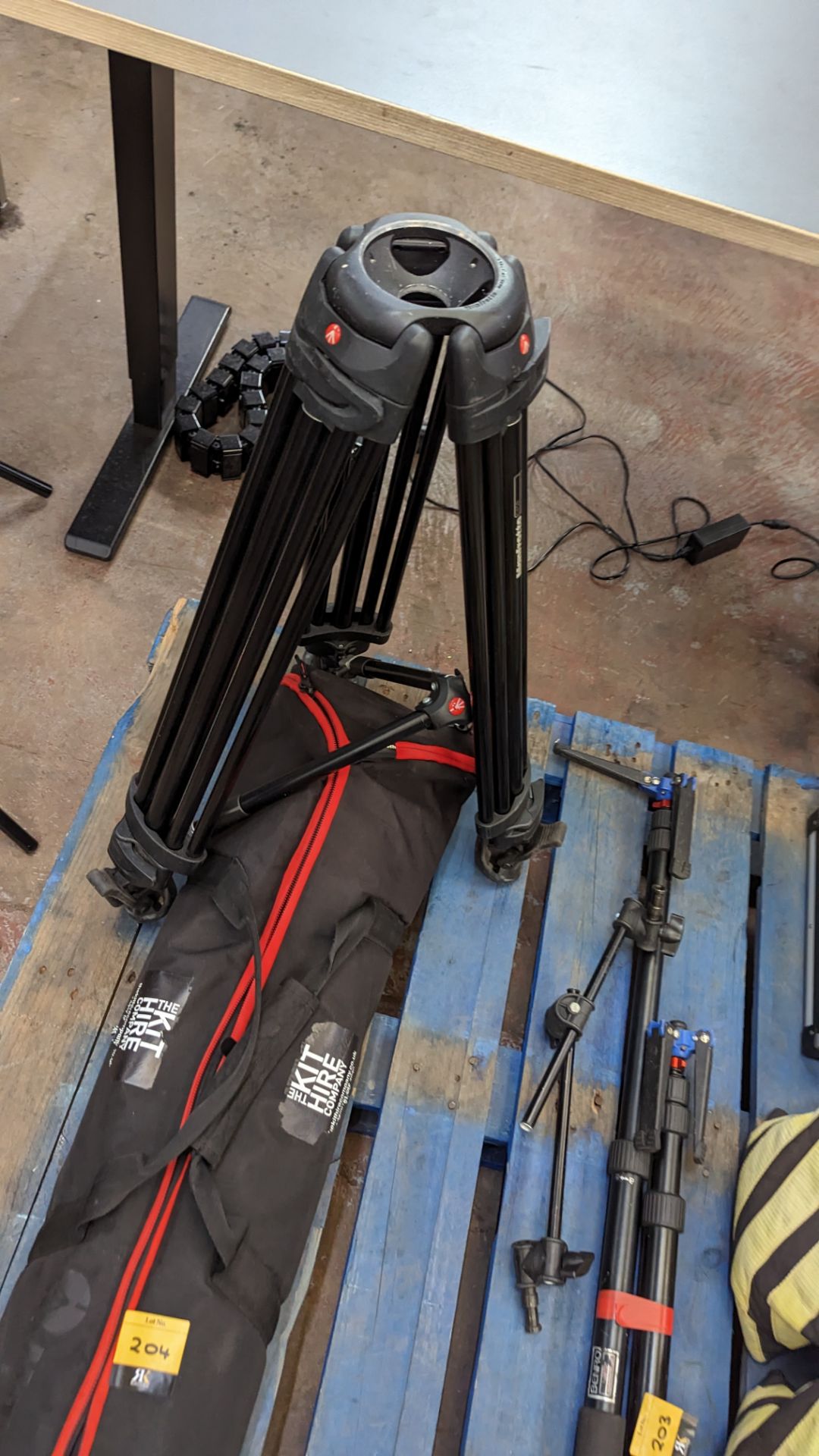 Mixed lot comprising Manfrotto 545B tripod legs (no head), mid level spreader & soft bag (damage to - Image 3 of 9