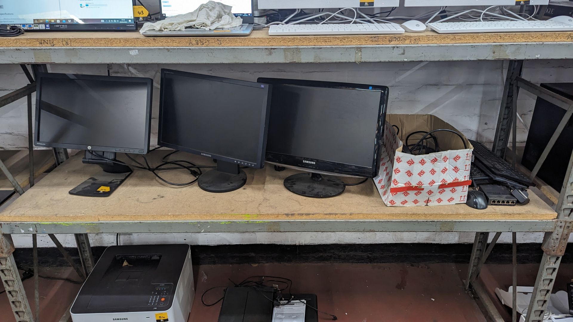 The contents of a shelf of assorted IT equipment including monitors, cables, keyboards, headphones & - Image 3 of 10