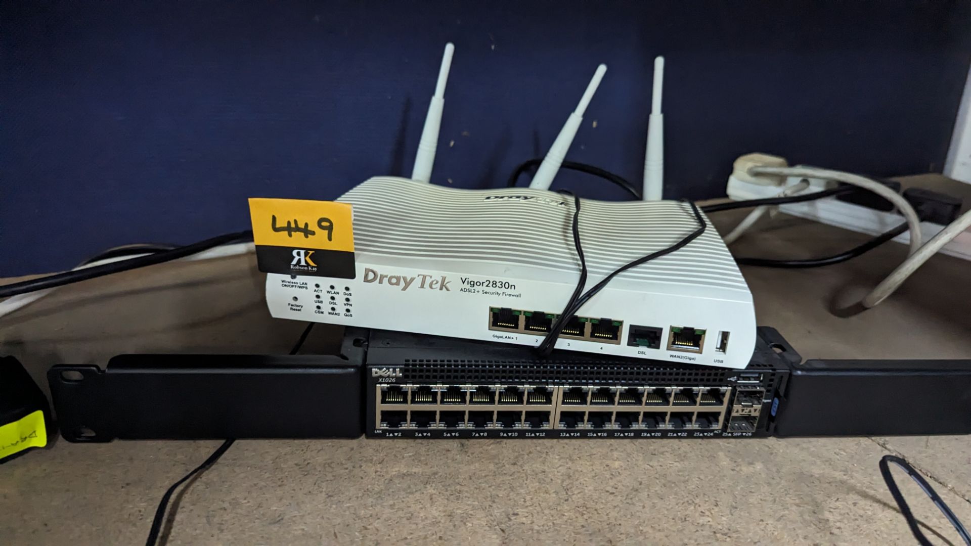 24 port switch with rack mounting ears plus Draytek Vigor 2830N modem/firewall