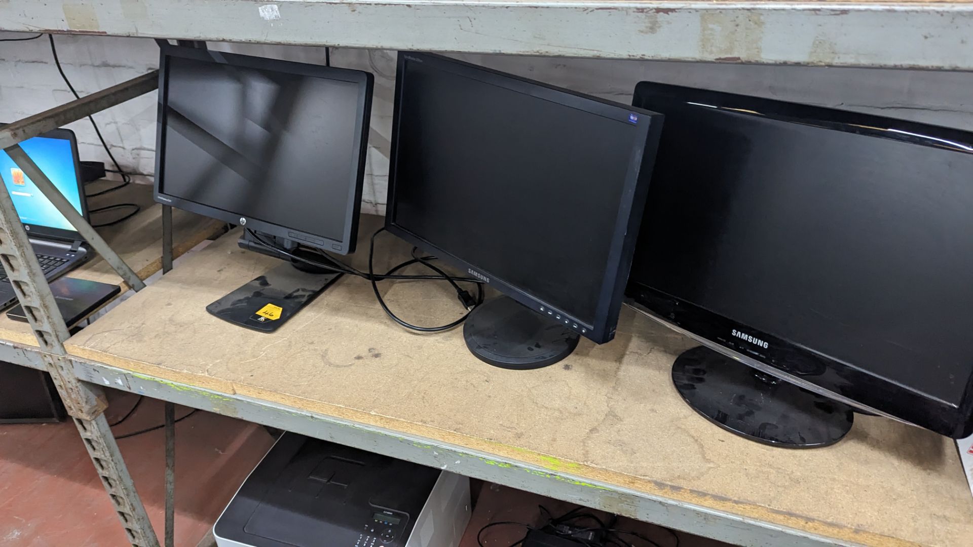 The contents of a shelf of assorted IT equipment including monitors, cables, keyboards, headphones & - Image 10 of 10