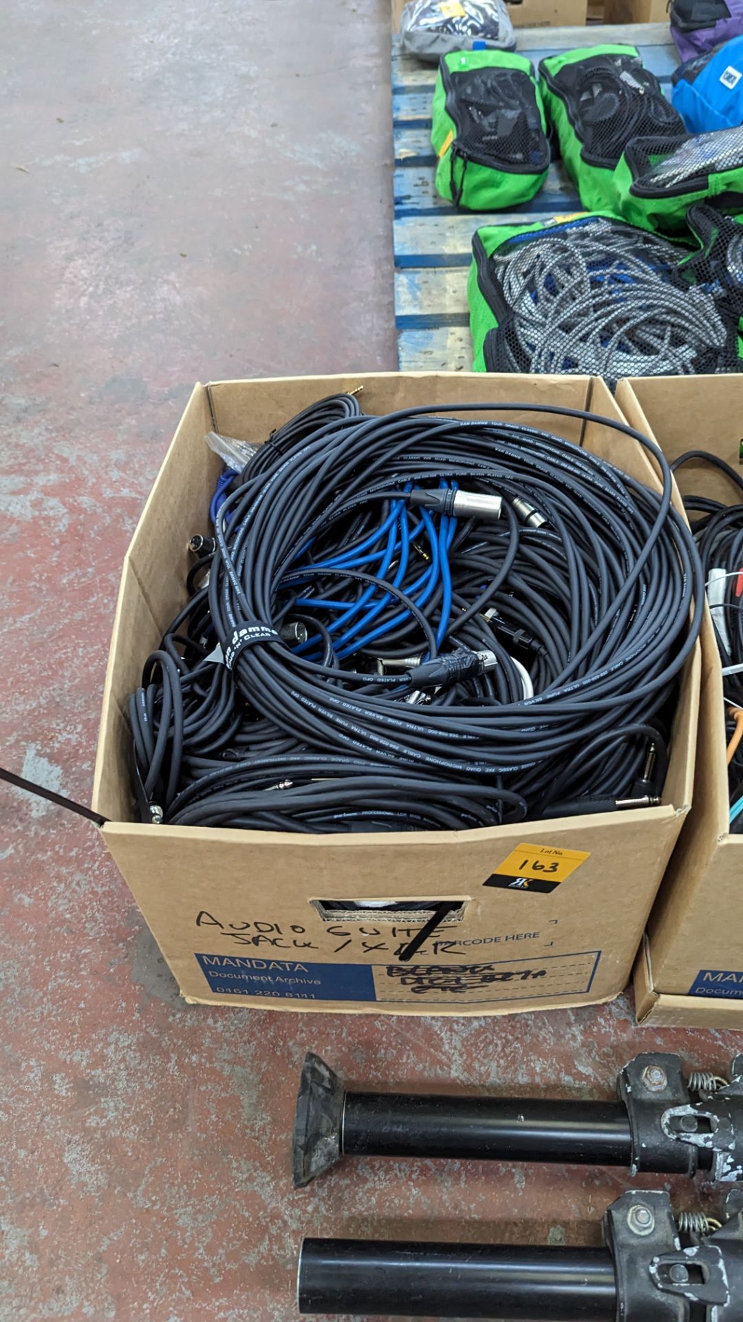 Box of XLR to 1/4" jack cables, most Starquad