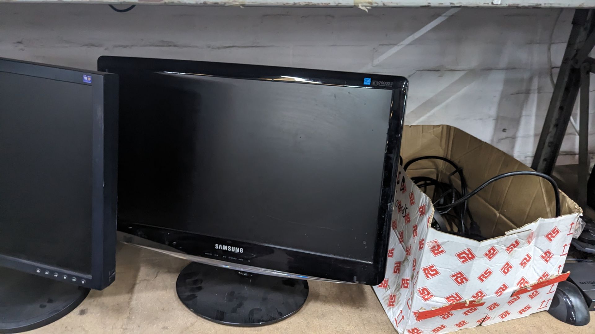 The contents of a shelf of assorted IT equipment including monitors, cables, keyboards, headphones & - Image 6 of 10