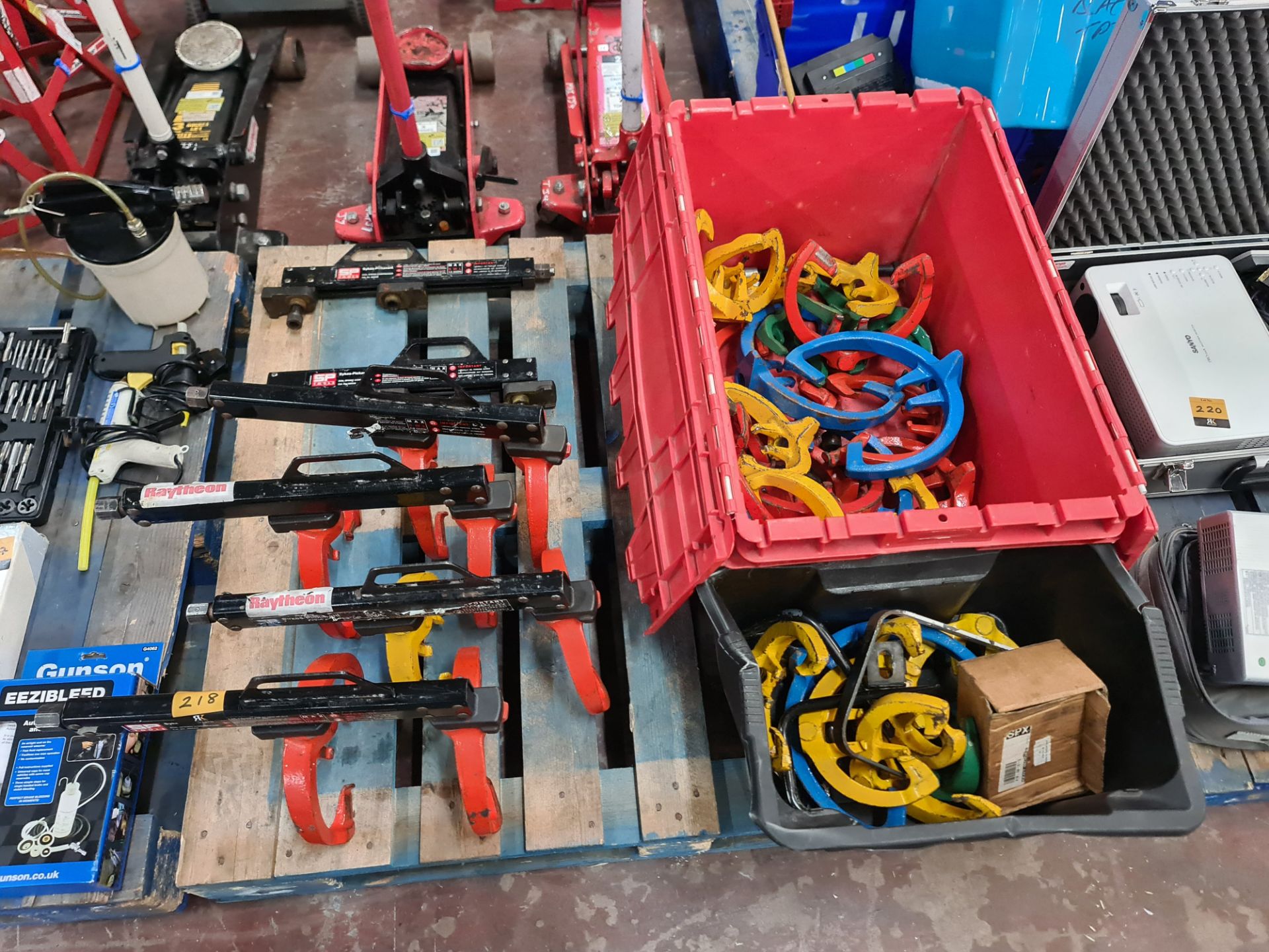 The contents of a pallet of coil spring compressor equipment comprising 6 off compressors, some of w