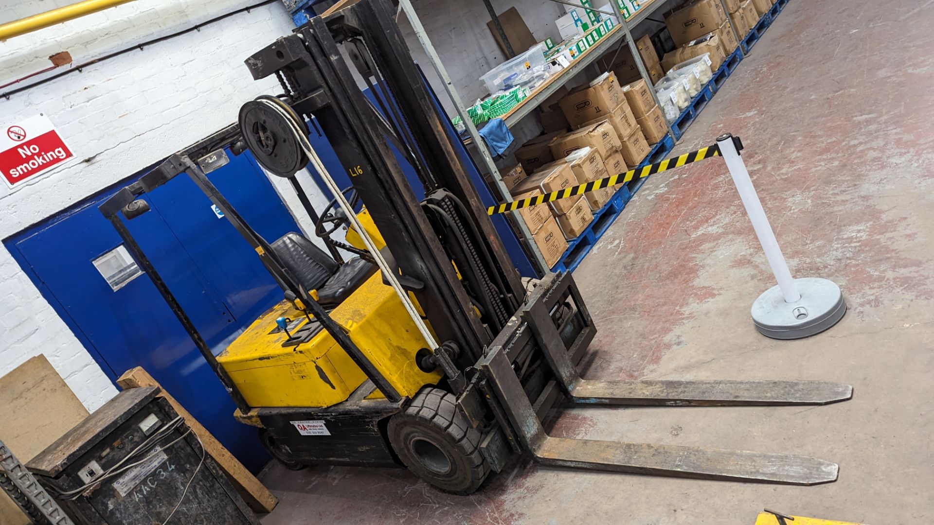 Clarke Engineering electric forklift truck, model EM20, including charger. The truck features side