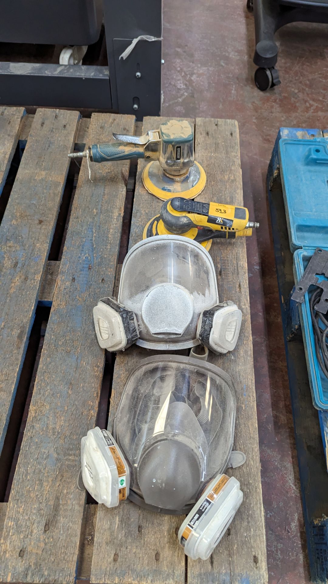 Mixed lot comprising pair of protective breathing masks & pair of air operated sanders