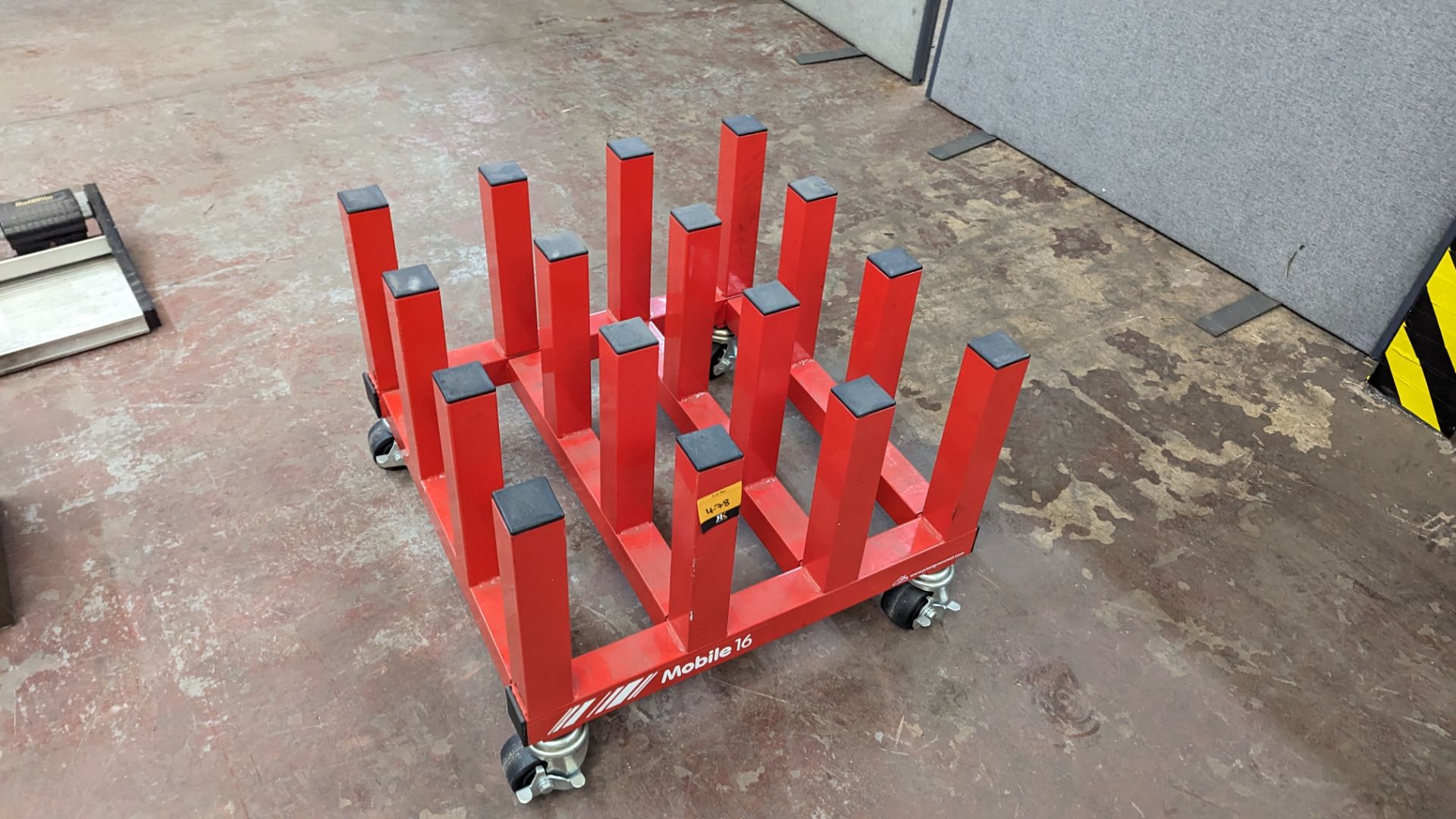 Mobile 16 red materials handling trolley with 16 "stumps"