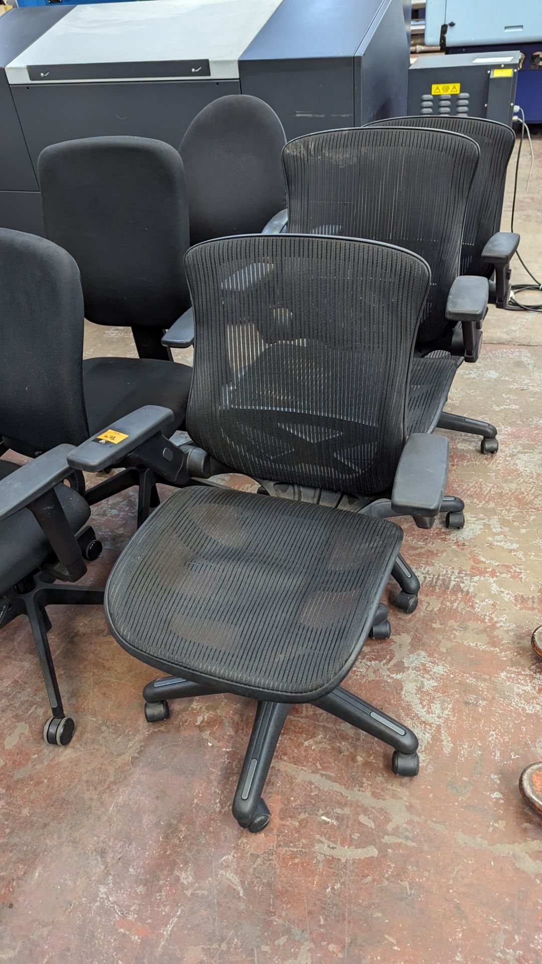 3 matching mesh black operators chairs with arms