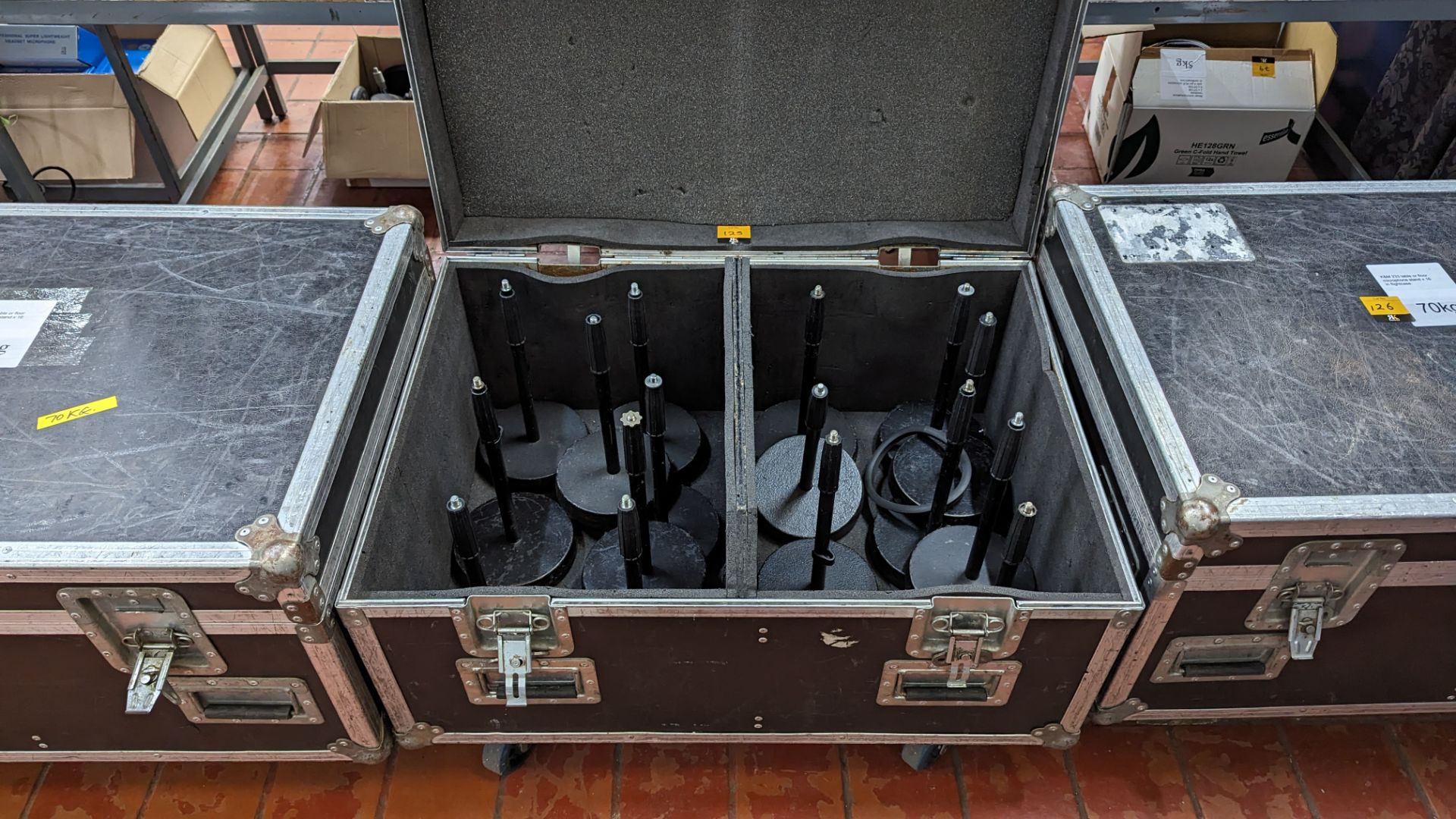 16 off K&M model 233 table or floor microphone stands, including flight case. Total lot weight: 70k