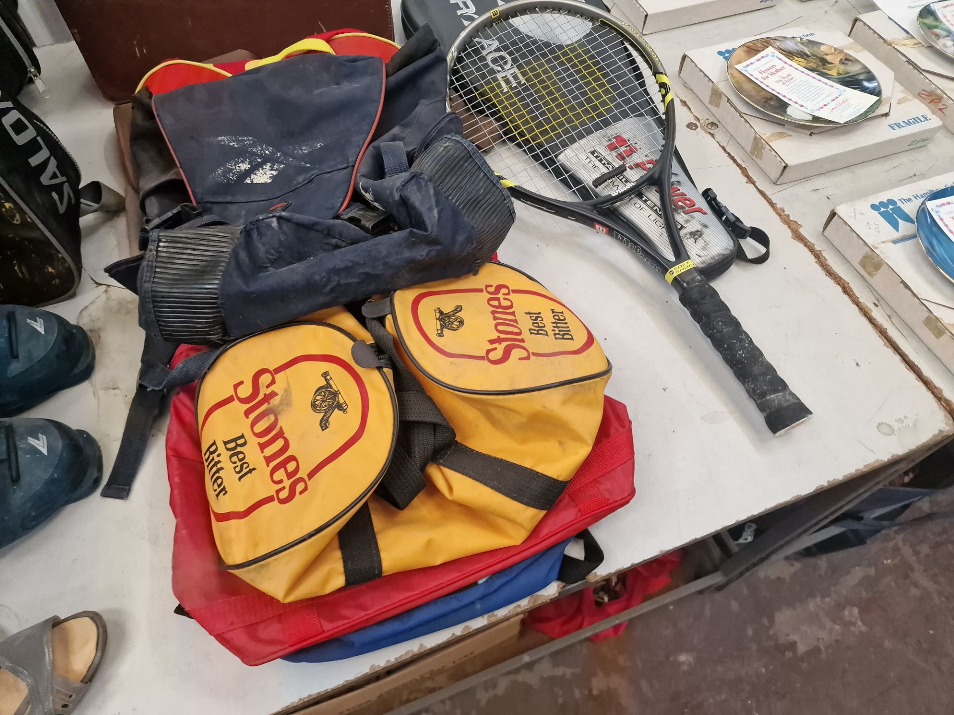 The contents of a table comprising a pair of ski boots and a bag, quantity of luggage, 2 off rackets - Image 7 of 7