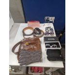 Quantity of accessories including handbag, gloves, belt, sunglasses, costume jewellery and more