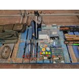 The contents of a pallet of fishing related items including line, floats, spinners, stands and much