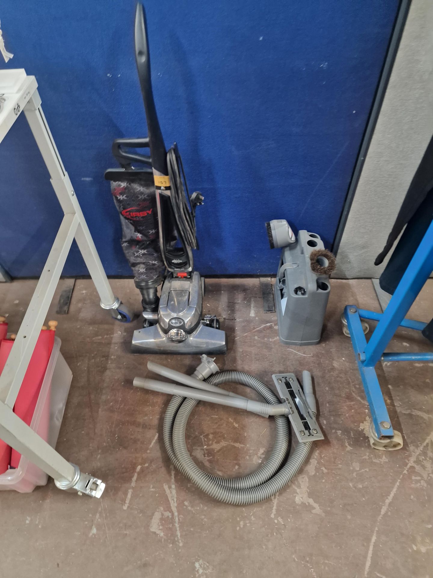 Kirby model G10E Sentria vacuum cleaner, including various accessories and stand for use with same,