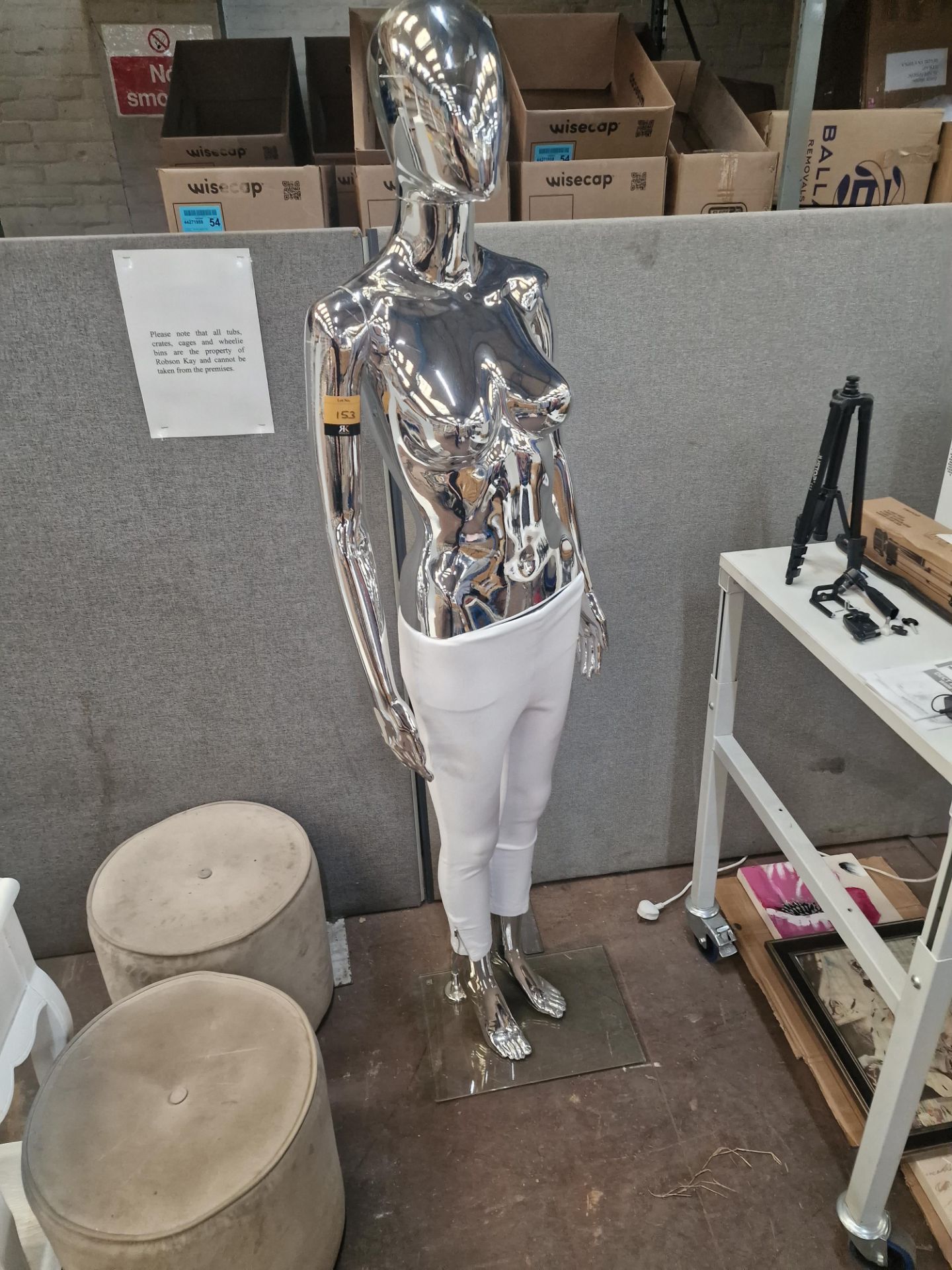 Silver mannequin on glass base includes white leggings, as pictured