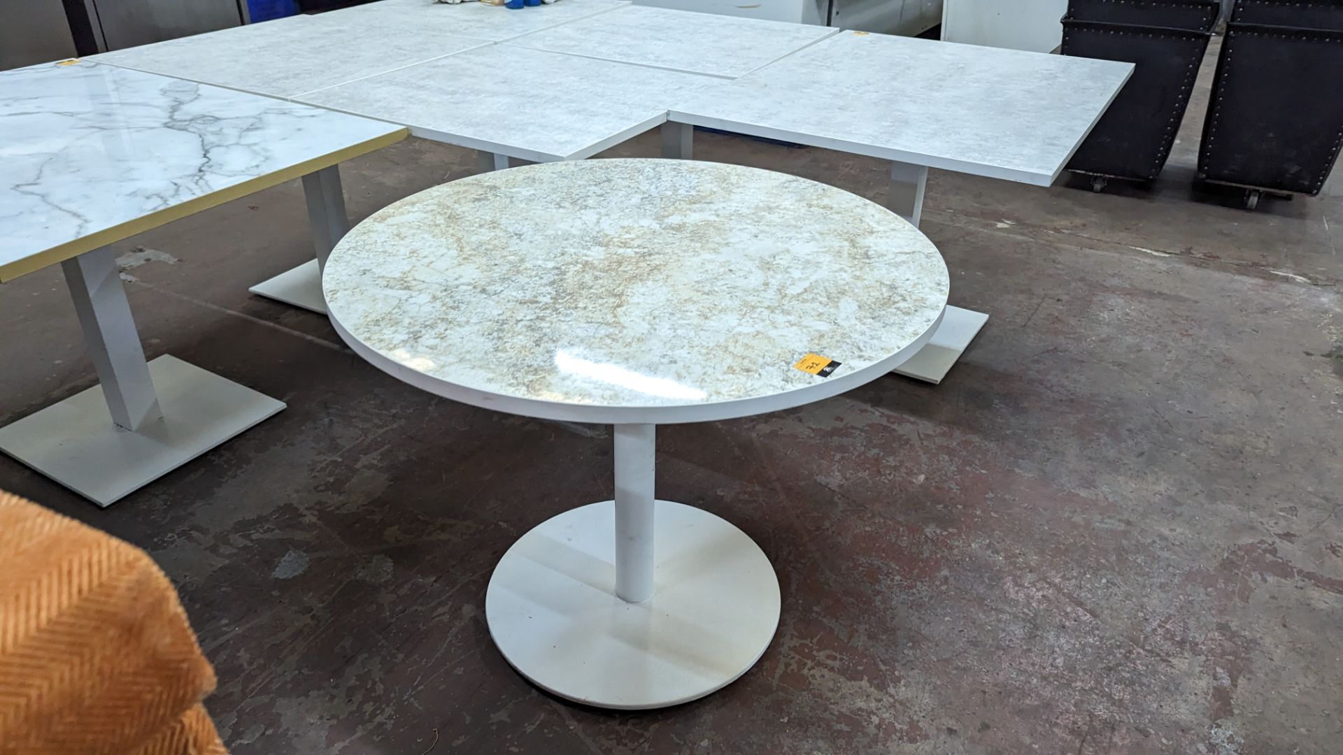 Single pedestal round dining table with marble effect top, approximately 1000mm diameter