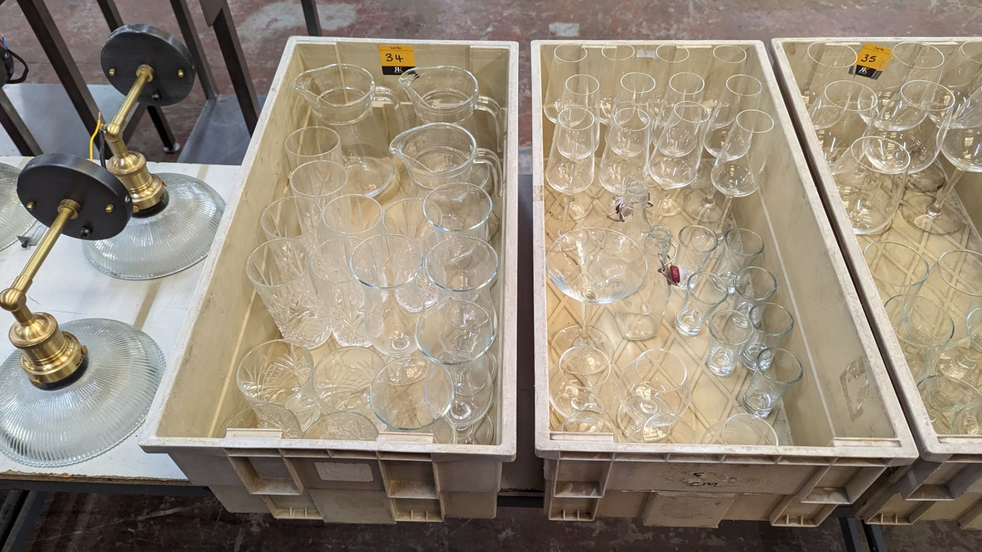 The contents of 2 crates of glassware including jugs, tumblers, dessert glasses, brandy glasses and - Image 2 of 6