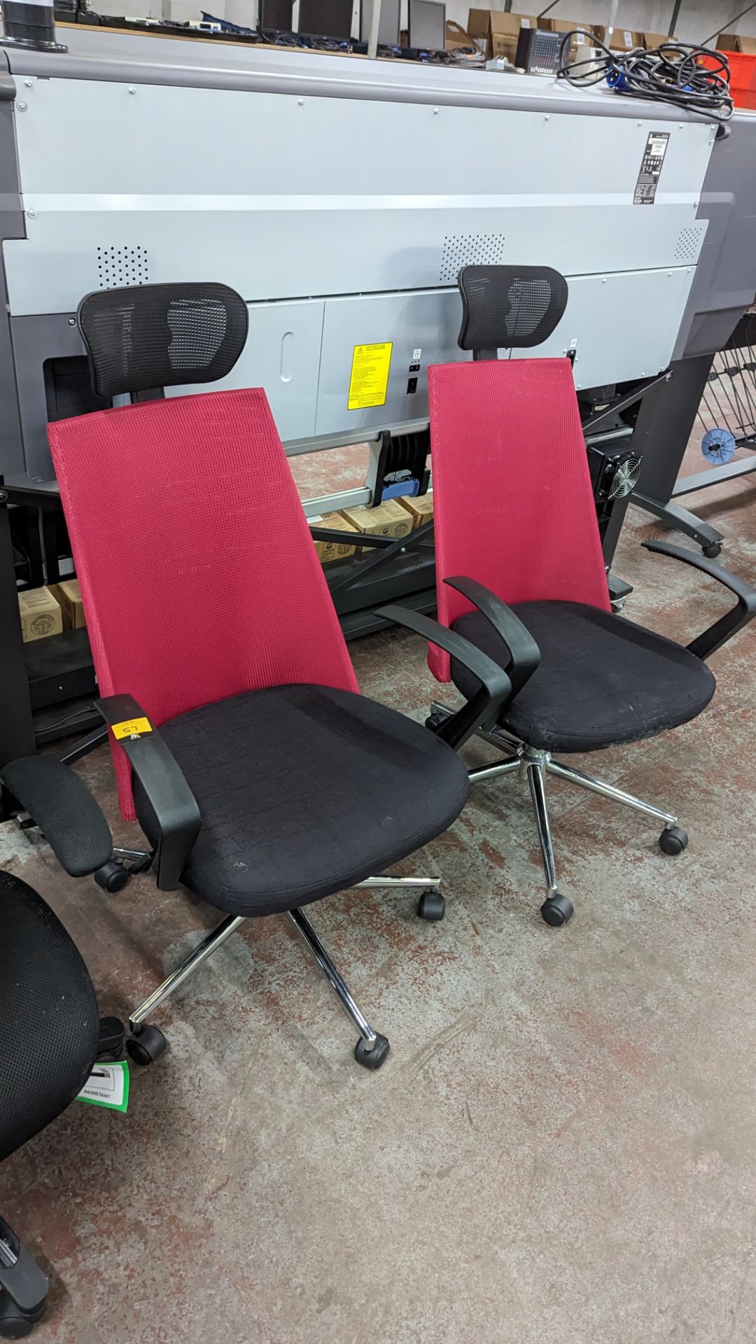 2 off matching modern black & magenta operator's chairs