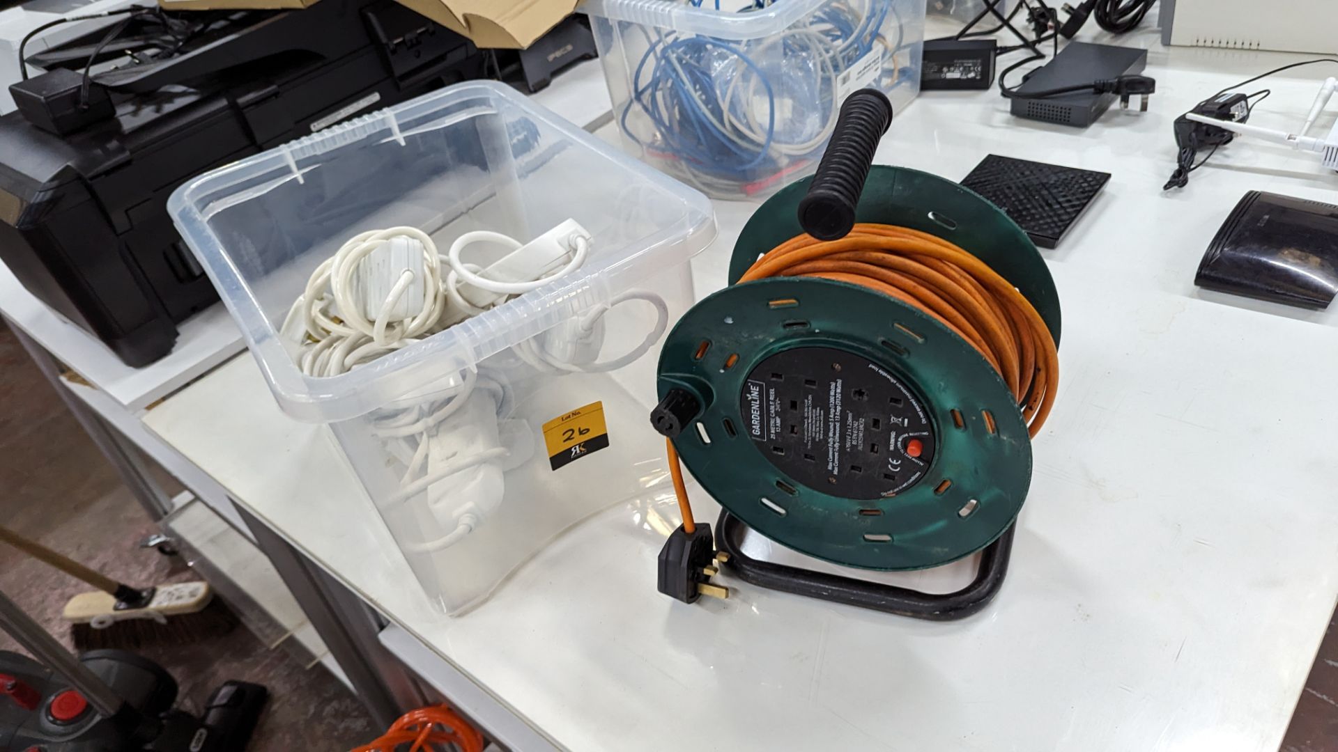 5 off trailing sockets plus multi-socket 25 metre cable reel - NB: crate excluded