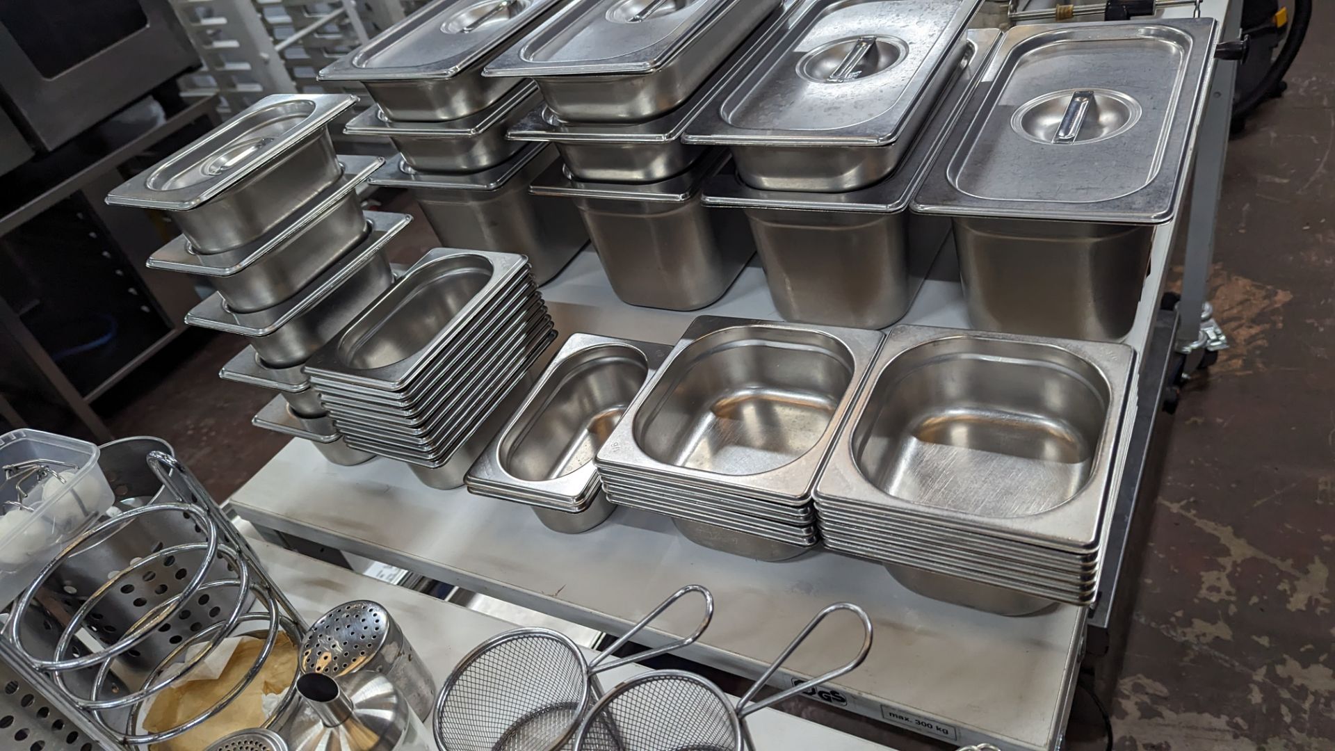 Large quantity of stainless steel storage receptacles, plus quantity of lids for use with same. In - Image 5 of 6