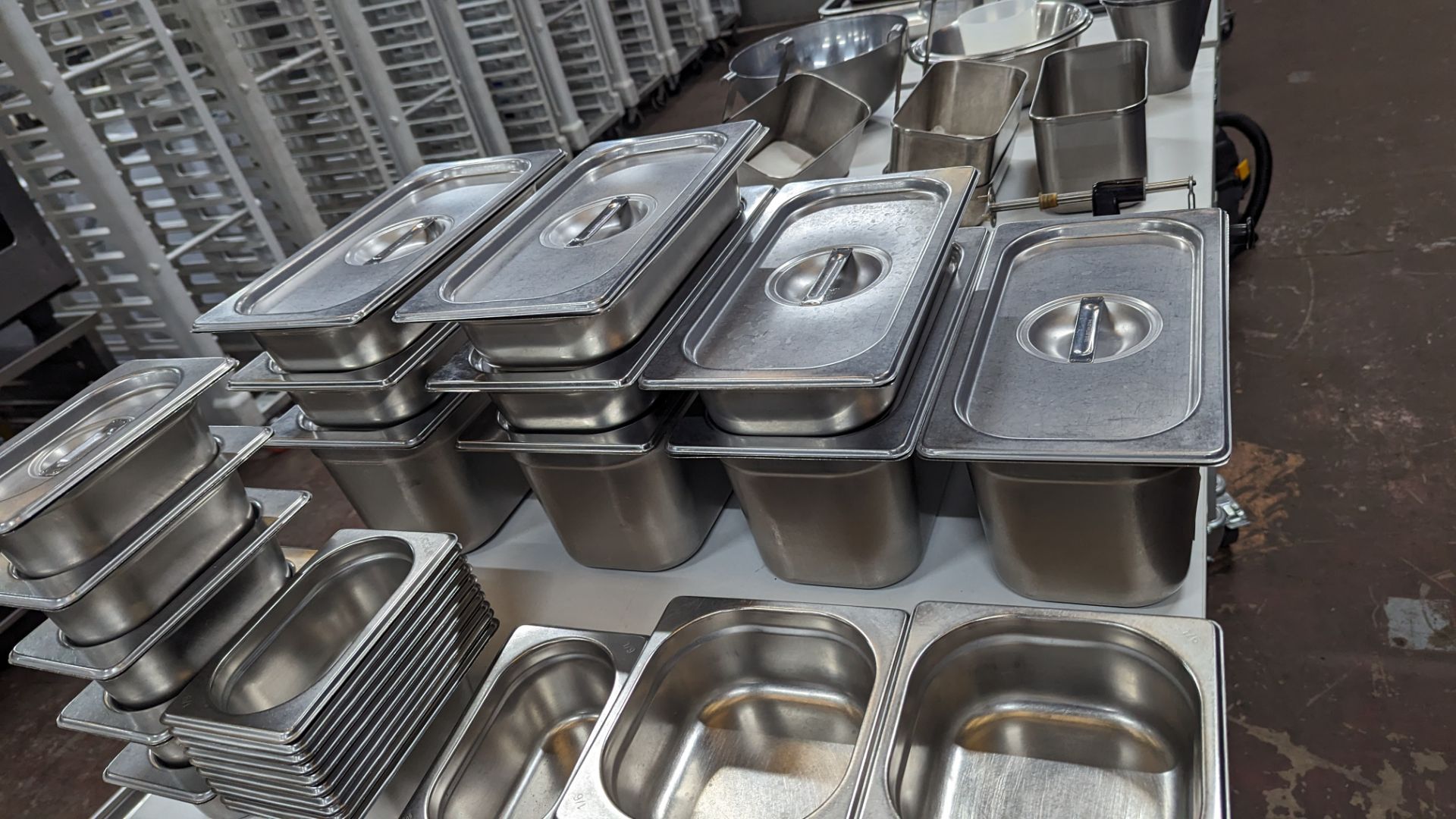 Large quantity of stainless steel storage receptacles, plus quantity of lids for use with same. In - Image 6 of 6