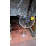2 off oversized plastic wine glasses each measuring 500mm tall