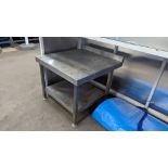 Stainless steel twin tier table measuring approximately 600mm x 650mm x 540mm