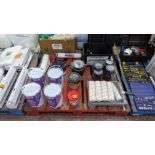 The contents of a pallet of decorating items including paint rollers, paint, tape & more