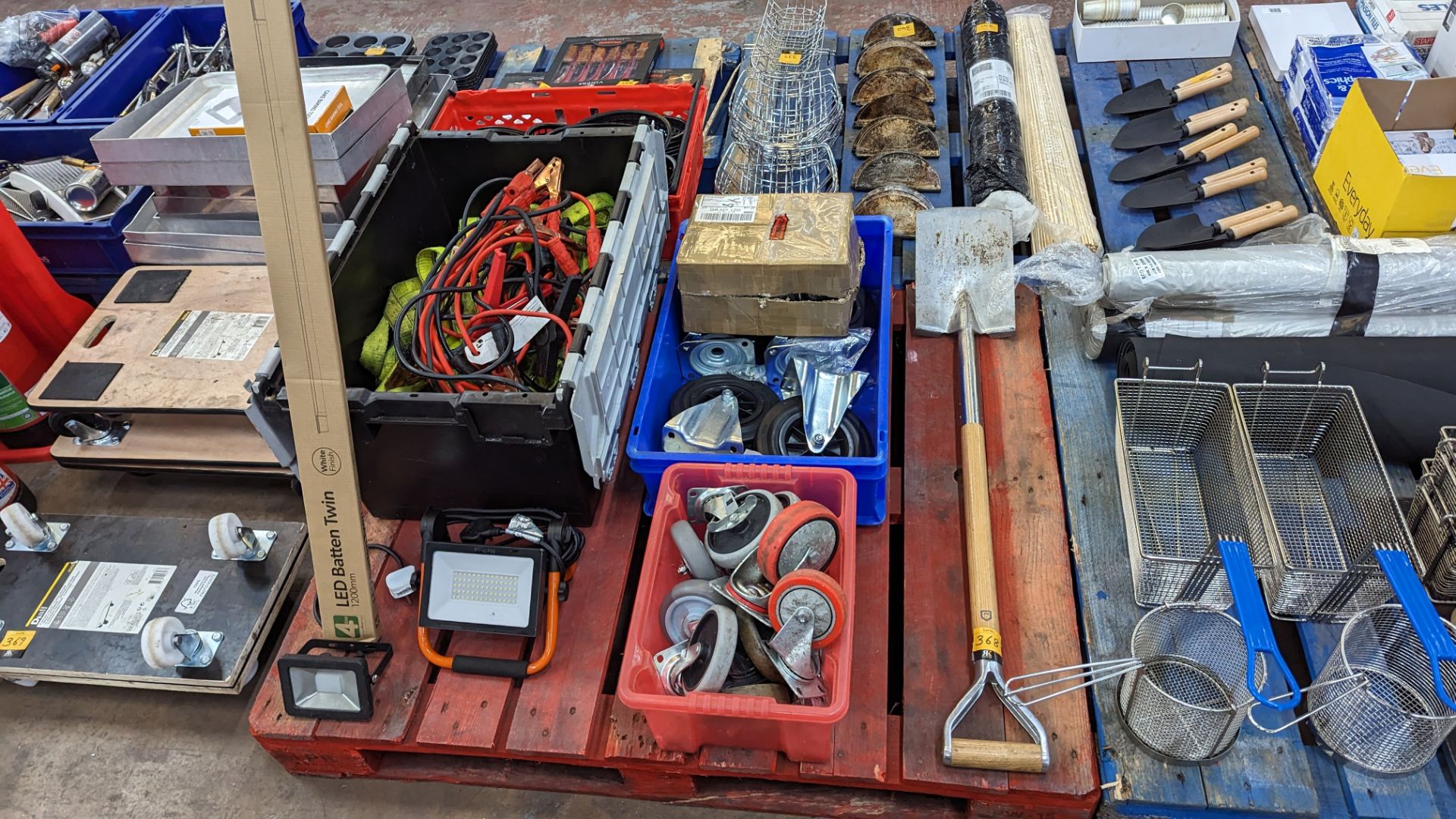 The contents of a pallet including long handle spade, jump start cables, safety harnesses, wheels, l - Image 2 of 10