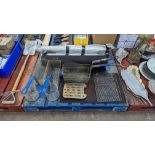 The contents of miscellaneous items including fryer baskets, trays, heat resistant matting & more