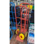 2 off tall red metal sack trucks plus 1 spare wheel & tyre