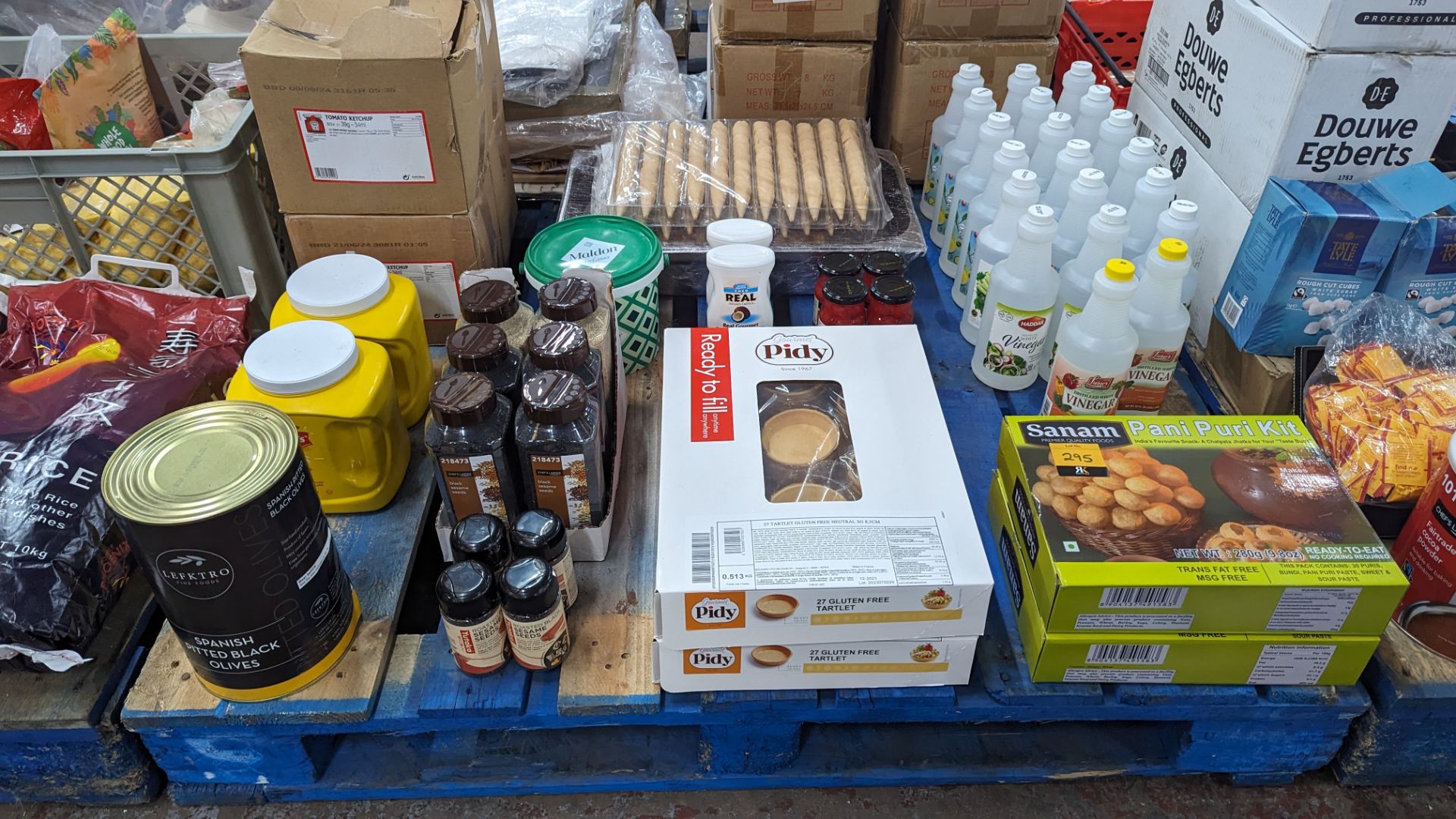 The contents of a pallet of food supplies including a large quantity of vinegar & a large quantity o - Image 2 of 11