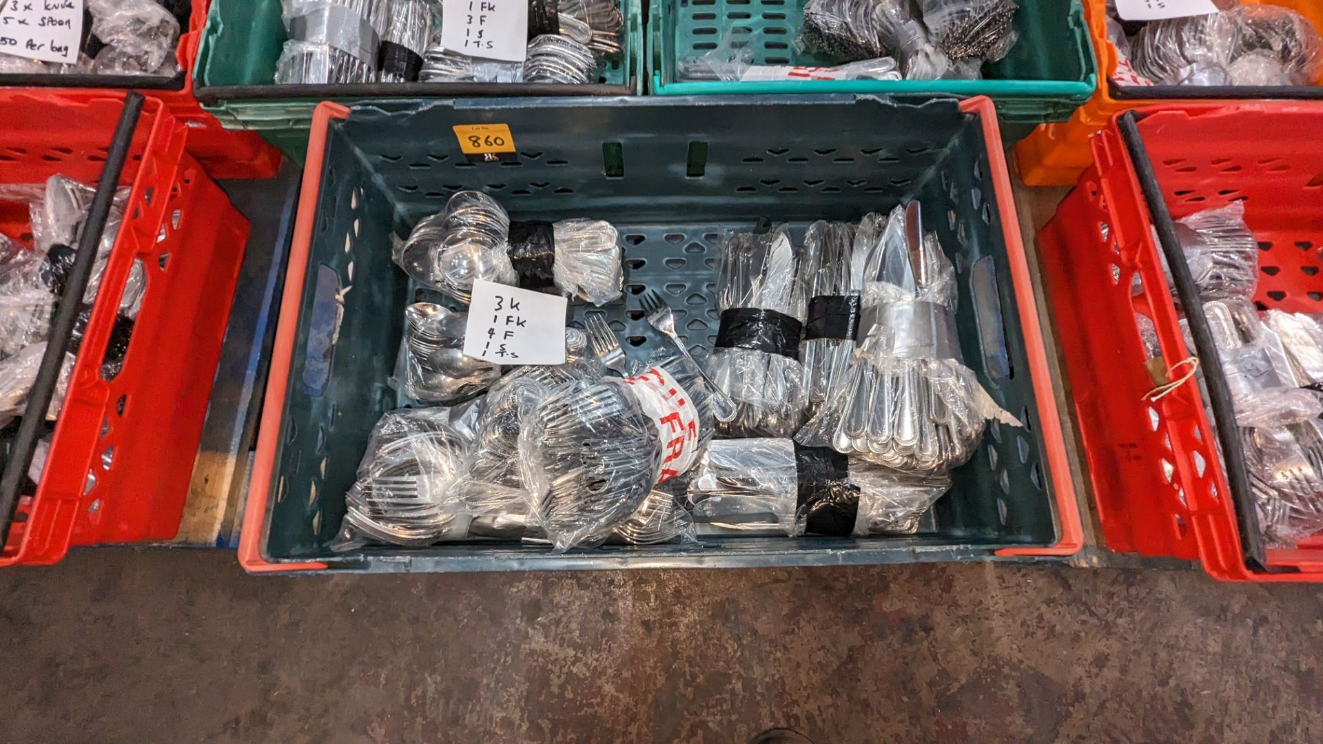 The contents of a crate of cutlery. Approximately 500 items in 10 bags of 50. This lot contains 3