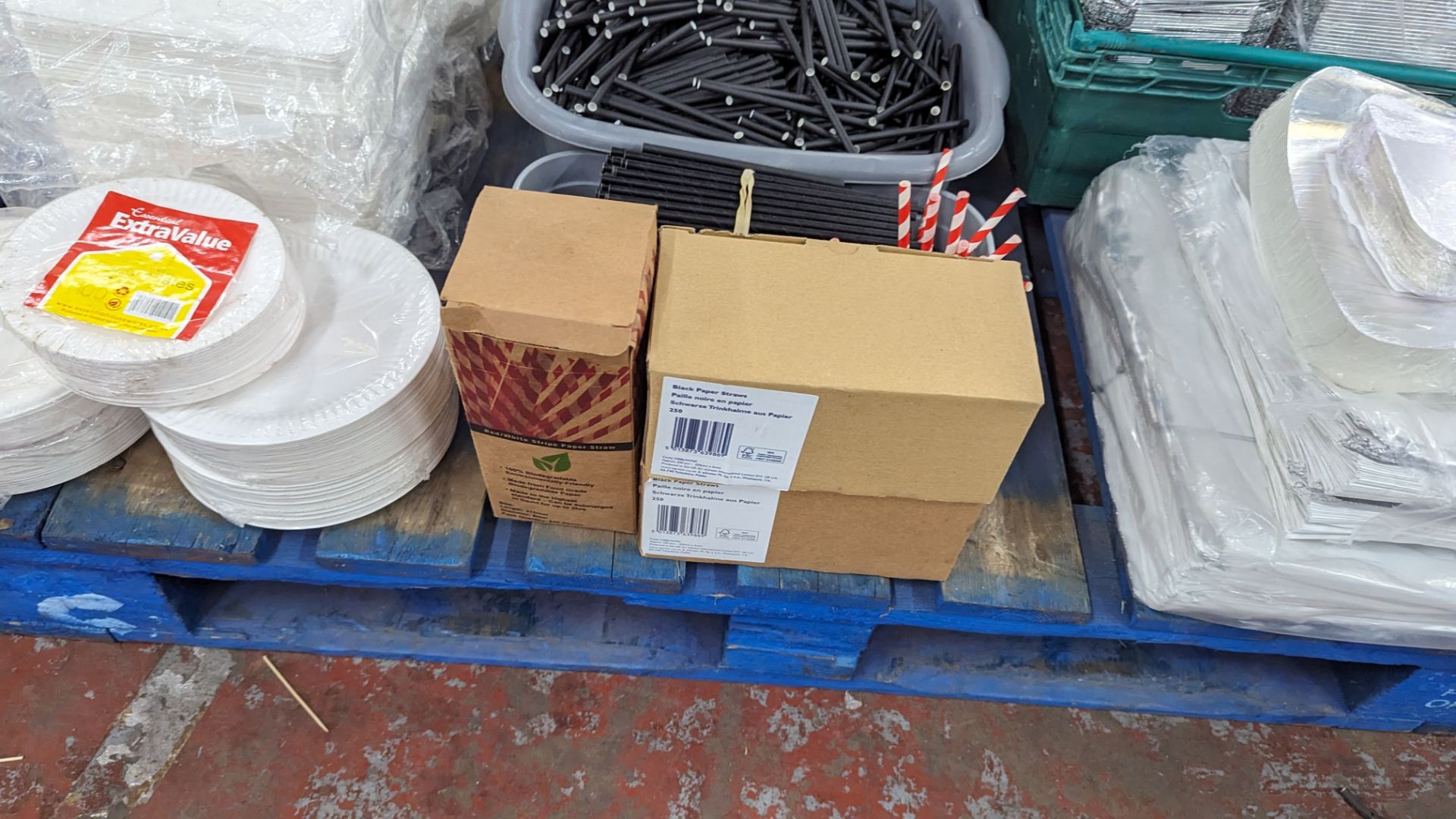 The contents of a pallet of disposable items including foil trays & lids, straws, plates & more. NB - Image 5 of 12