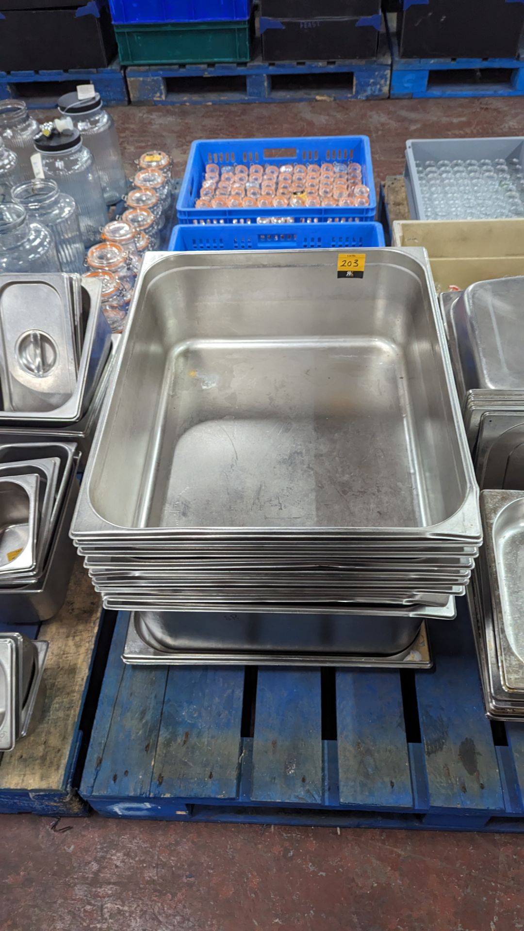 Stack of 11 large rectangular stainless steel shallow trays & deep dishes
