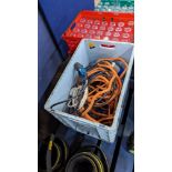 The contents of a crate of gas hose & electrical extension sockets