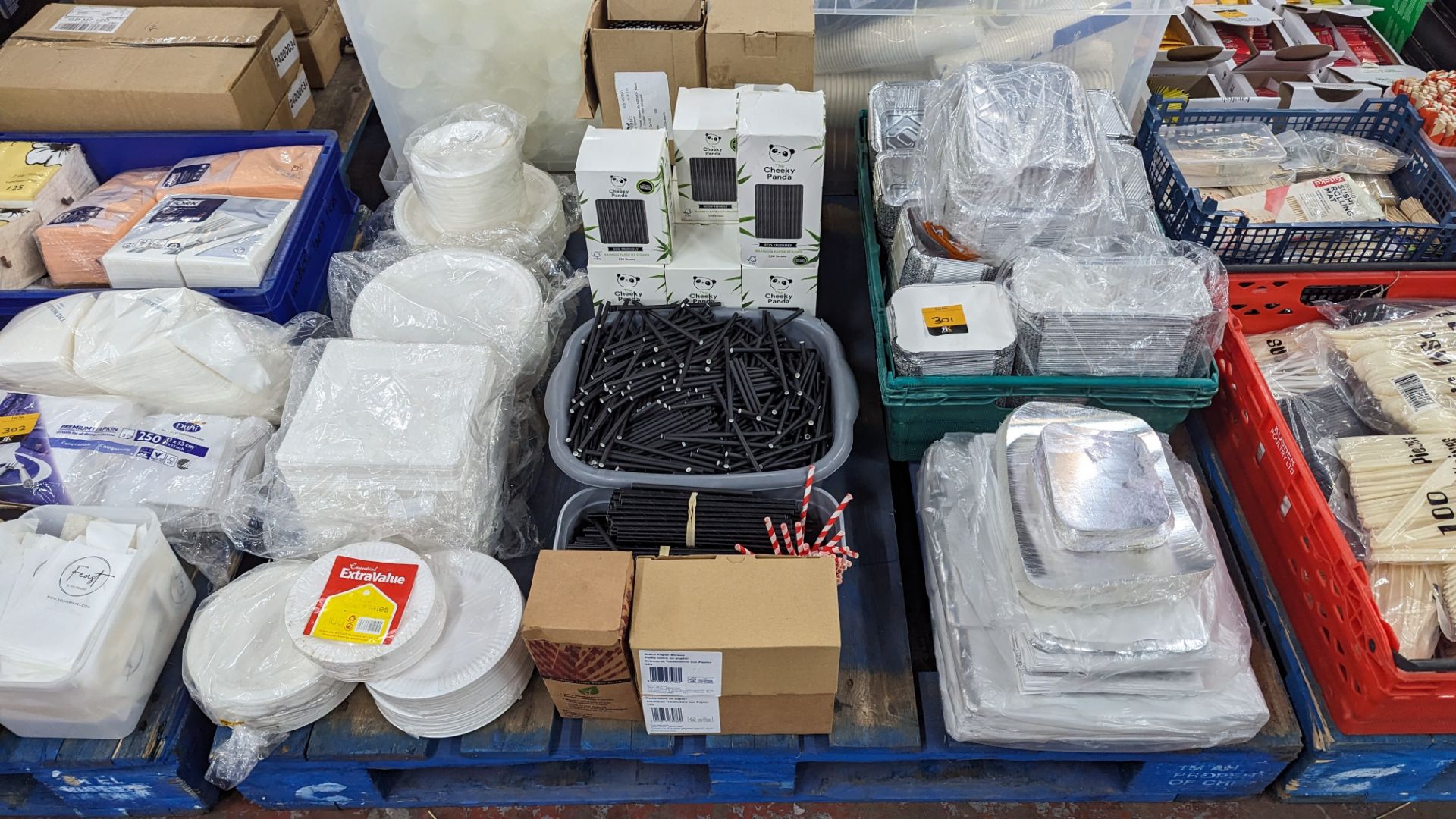 The contents of a pallet of disposable items including foil trays & lids, straws, plates & more. NB