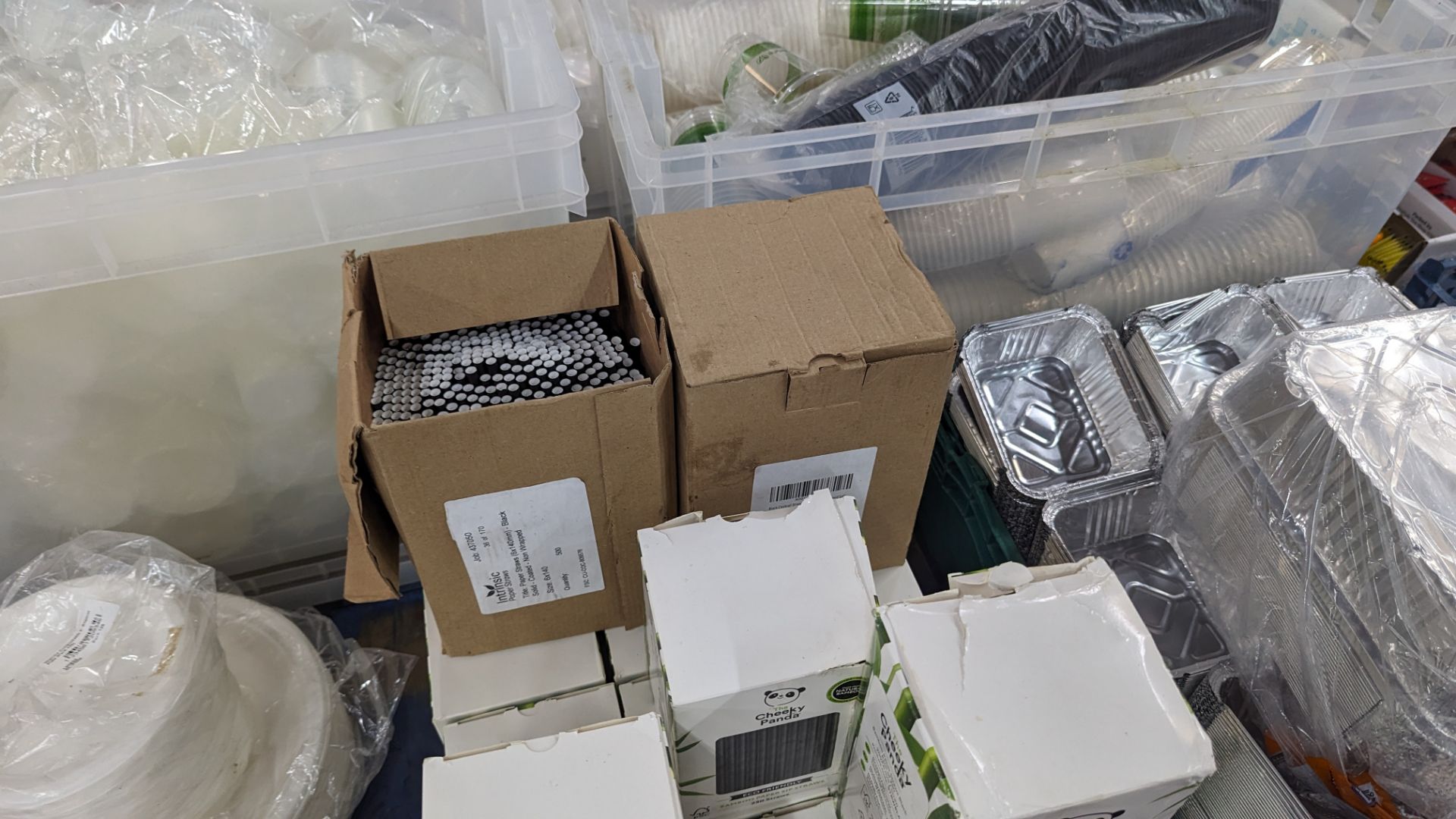 The contents of a pallet of disposable items including foil trays & lids, straws, plates & more. NB - Image 8 of 12