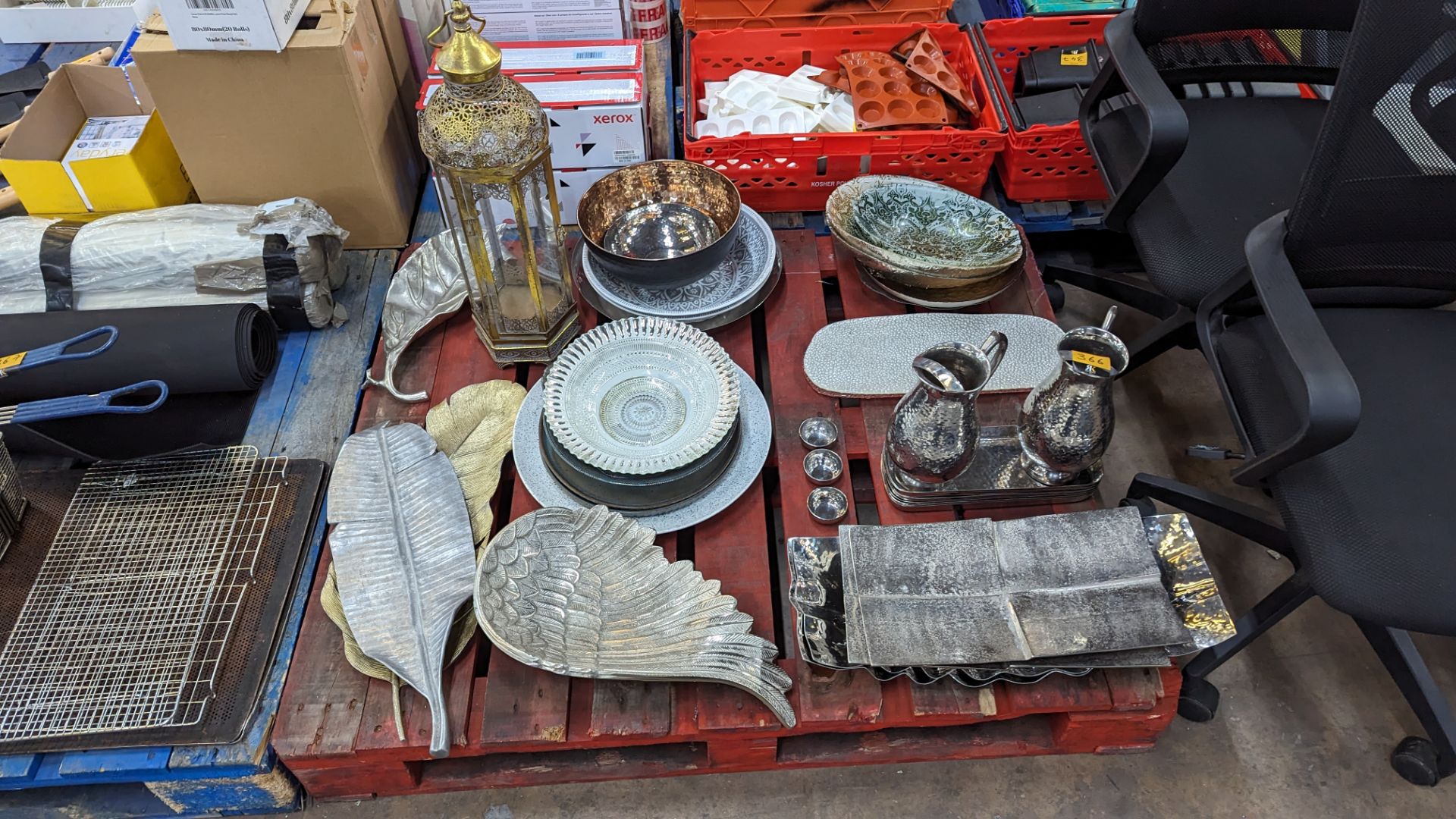The contents of a pallet of decorative items, mostly with Middle Eastern inspiration