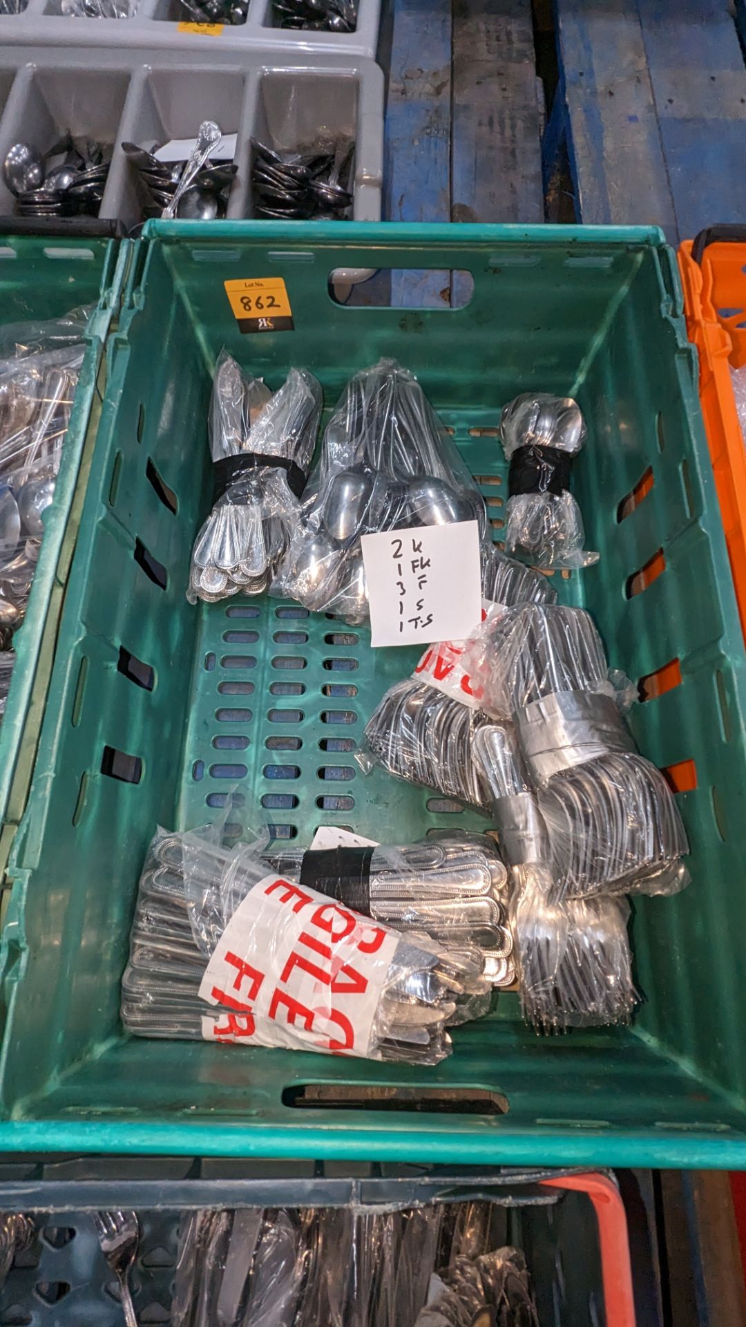 The contents of a crate of cutlery. Approximately 400 items in 8 bags of 50. This lot contains 2 b