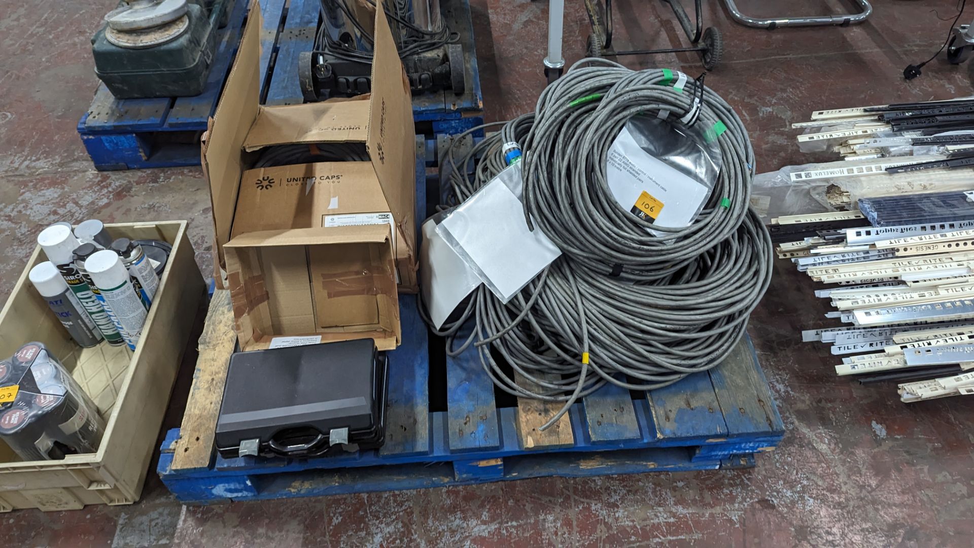 The contents of a pallet of assorted professional audio cable and a pair of Beringer hand held wirel