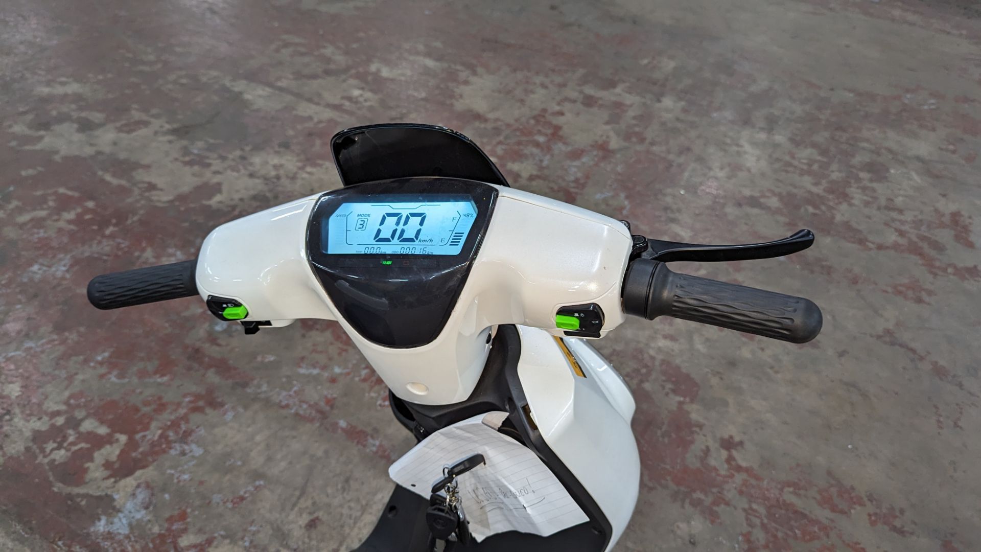 Model 18 Electric Bike: 15 recorded miles (understood to be a demonstrator), white body with black d - Image 8 of 12