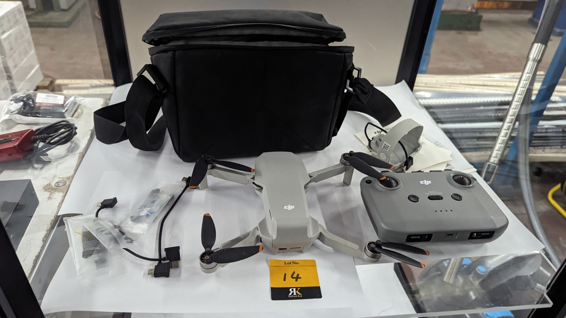 DJI Mini 2 drone including soft carry case, controller and other ancillaries. NB: no battery