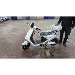 Model 18 Electric Bike: Zero (0) recorded miles, white body with black detailing, lockable storage b